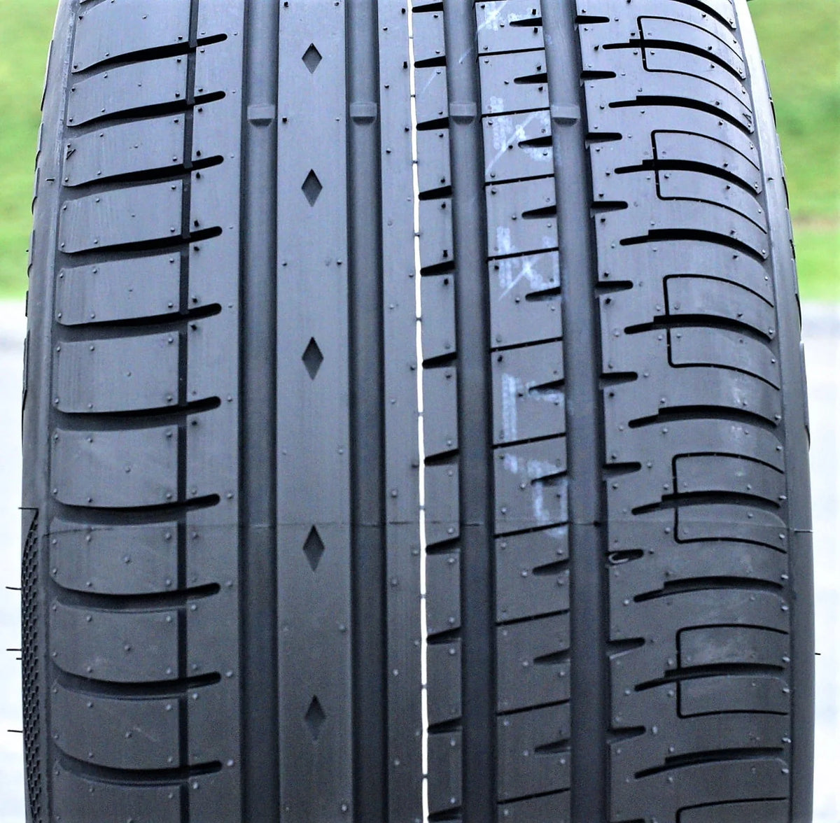 A pair of 2(2) 225/40R20 101W XL AS A/S performance tires